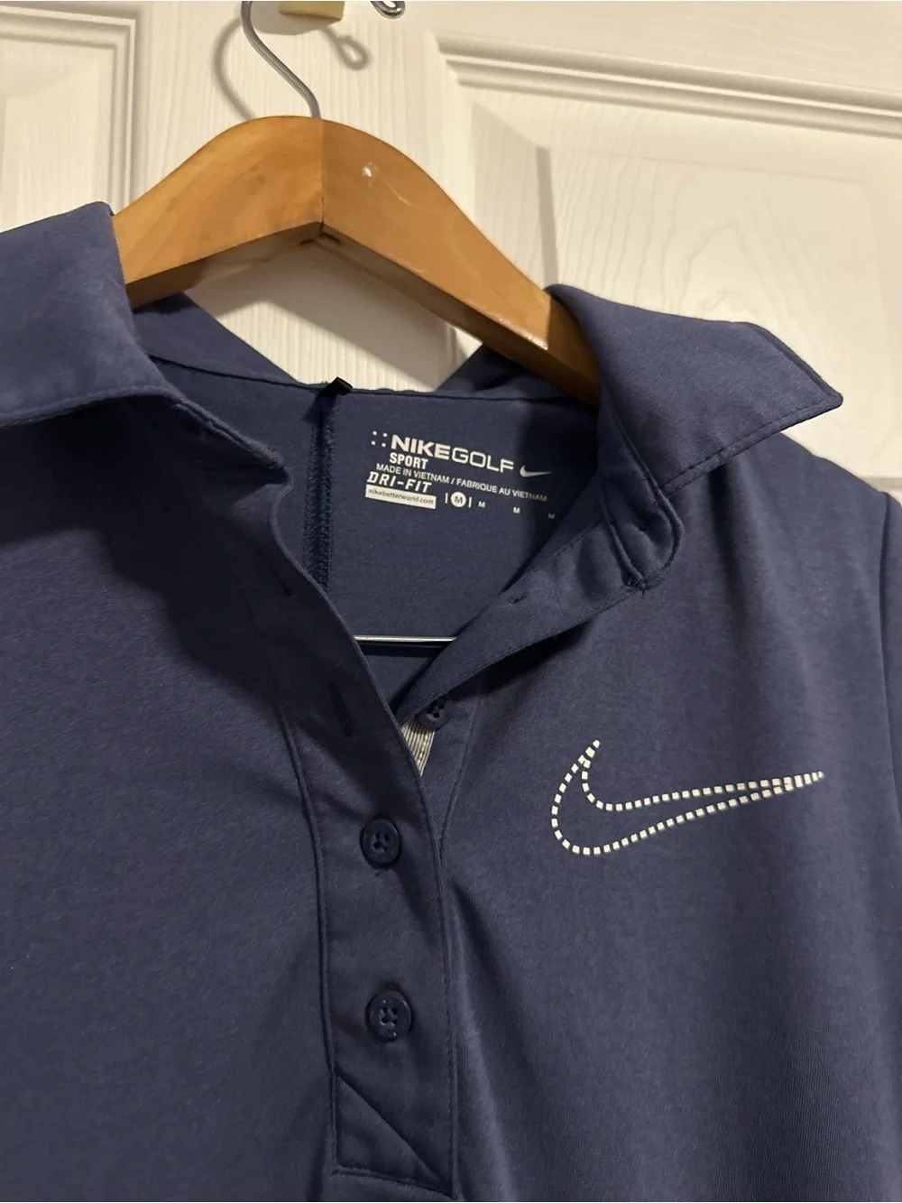 Nike Women's Navy Polo Top with Rhinestone Swoosh